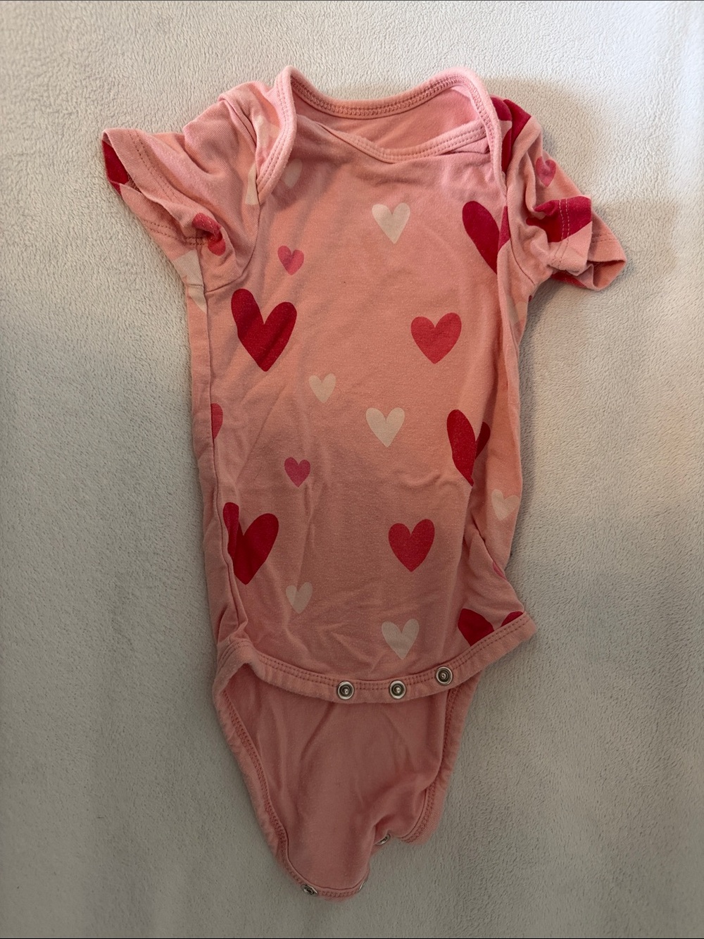 Kyte BABY Pink and Red Heart Print One-Piece Bodysuit
